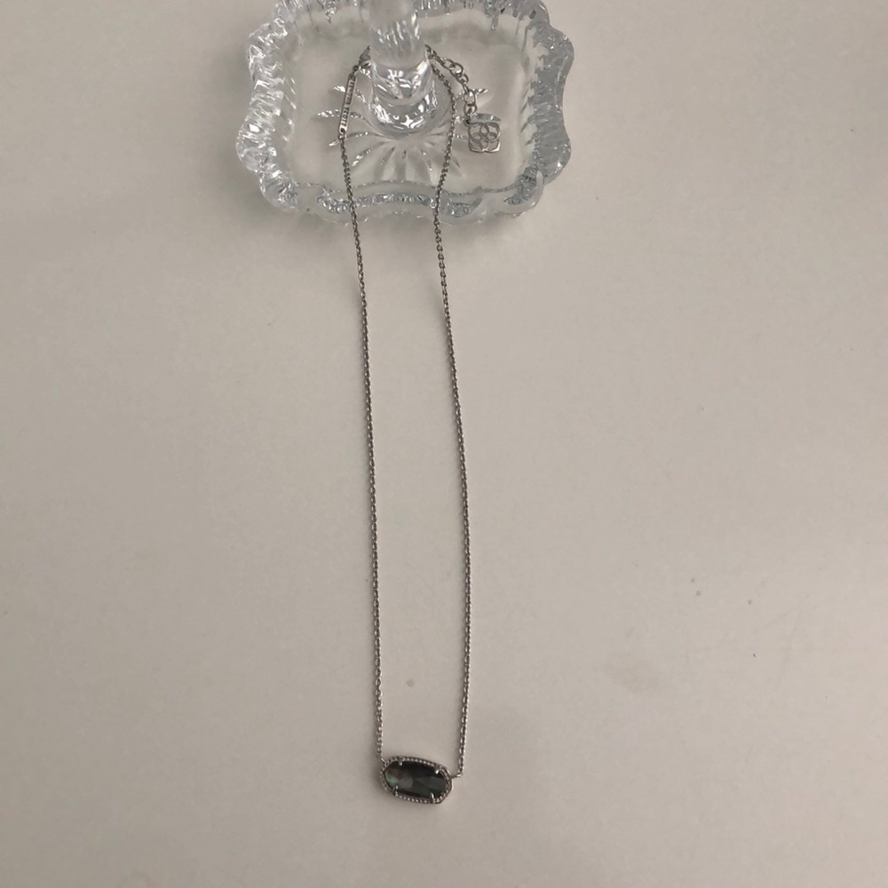 Kendra Scott necklace.